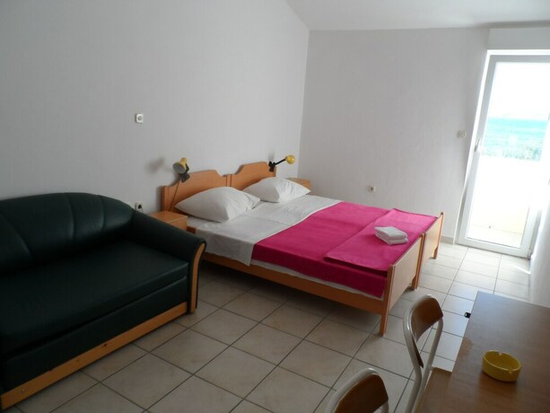Imagen de la habitación del Hotel Rooms and Apartments Galeb. Foto 28
