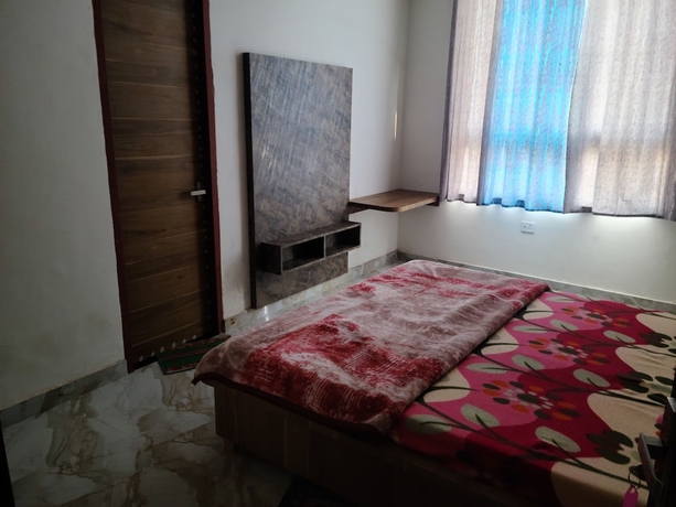 Imagen de la habitación del Hotel Roomshala 153 Krishnashrya, Vrindavan. Foto 5