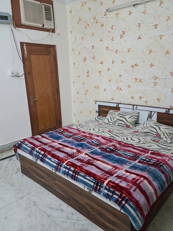 Imagen de la habitación del Hotel Roomshala 153 Krishnashrya, Vrindavan. Foto 9