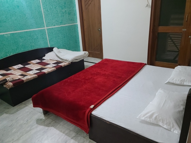 Imagen de la habitación del Hotel Roomshala 153 Krishnashrya, Vrindavan. Foto 10