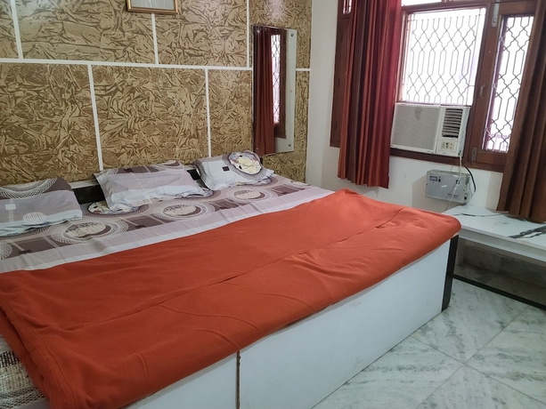 Imagen de la habitación del Hotel Roomshala 153 Krishnashrya, Vrindavan. Foto 11