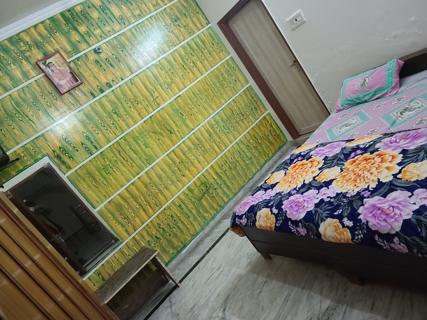 Imagen de la habitación del Hotel Roomshala 153 Krishnashrya, Vrindavan. Foto 18
