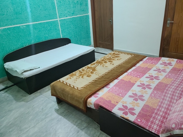Imagen de la habitación del Hotel Roomshala 153 Krishnashrya, Vrindavan. Foto 6