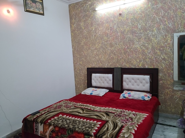 Imagen de la habitación del Hotel Roomshala 153 Krishnashrya, Vrindavan. Foto 10