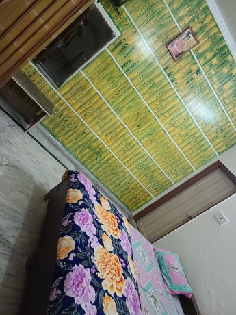 Imagen de la habitación del Hotel Roomshala 153 Krishnashrya, Vrindavan. Foto 17
