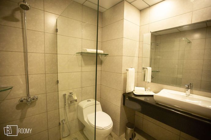 Imagen de la habitación del Hotel Roomy Signature. Foto 11