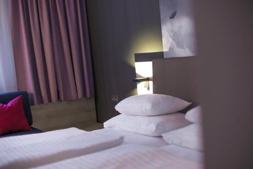 Imagen de la habitación del Hotel Roomz Vienna Prater. Foto 10