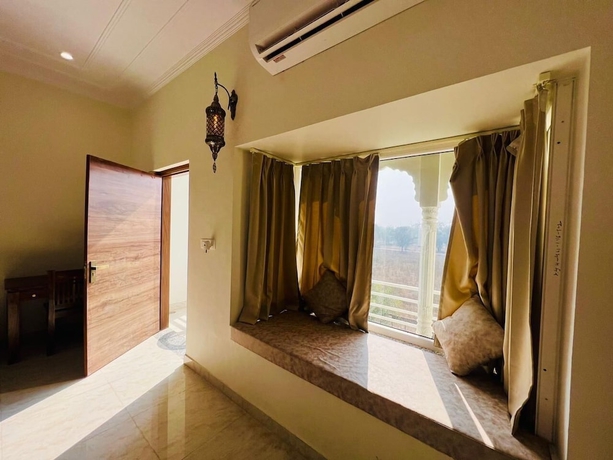 Imagen de la habitación del Hotel Roop Garh Palace. Foto 7