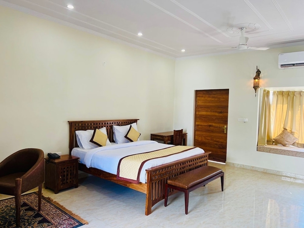Imagen de la habitación del Hotel Roop Garh Palace. Foto 11