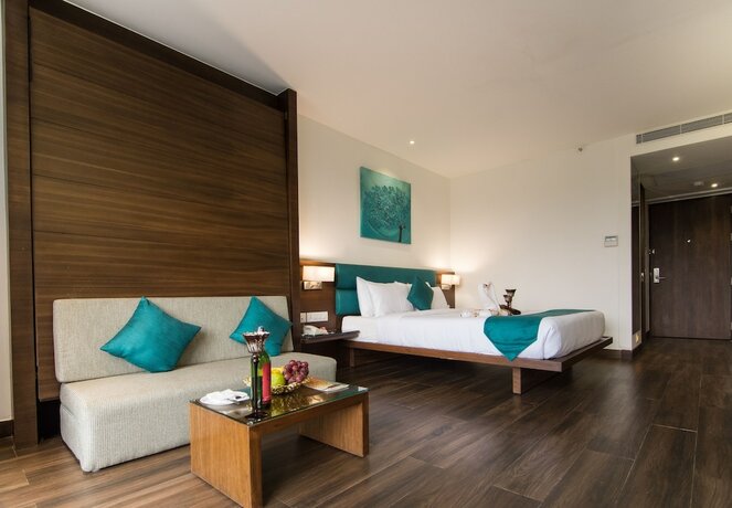 Imagen de la habitación del Hotel Roopa Elite. Foto 16