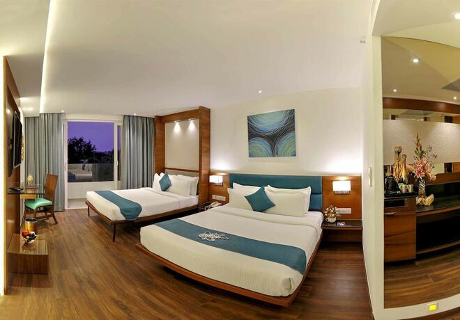 Imagen de la habitación del Hotel Roopa Elite. Foto 20