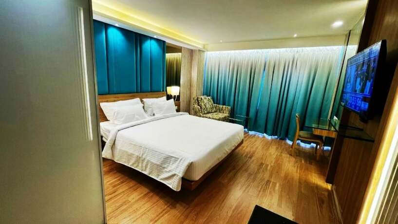 Imagen de la habitación del Hotel Roopa Elite. Foto 24