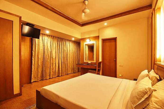 Imagen de la habitación del Hotel Roopa. Foto 13