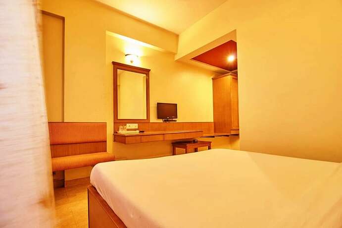 Imagen de la habitación del Hotel Roopa. Foto 16