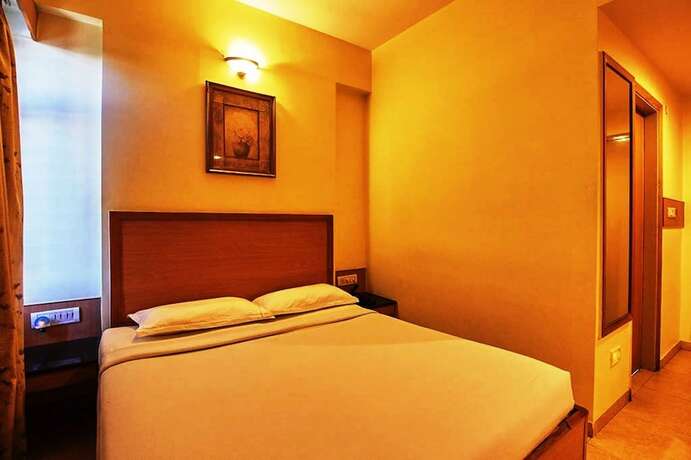 Imagen de la habitación del Hotel Roopa. Foto 19