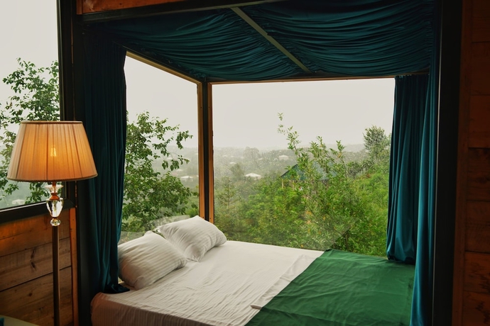 Imagen de la habitación del Hotel Roots Resort. Foto 5