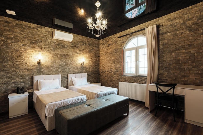 Imagen de la habitación del Hotel Roots Resort. Foto 6