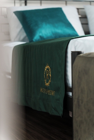 Imagen de la habitación del Hotel Roots Resort. Foto 16