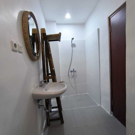 Imagen de la habitación del Hotel Roots Senggigi. Foto 5