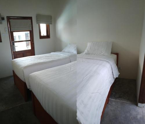 Imagen de la habitación del Hotel Roots Trawangan. Foto 20