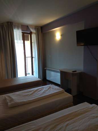 Imagen de la habitación del Hotel Roots and Wine Bar. Foto 19