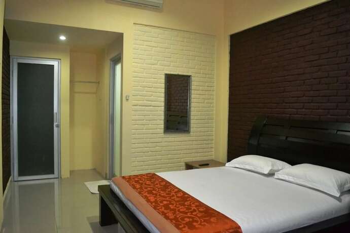 Imagen de la habitación del Hotel Rorompok Homan. Foto 3