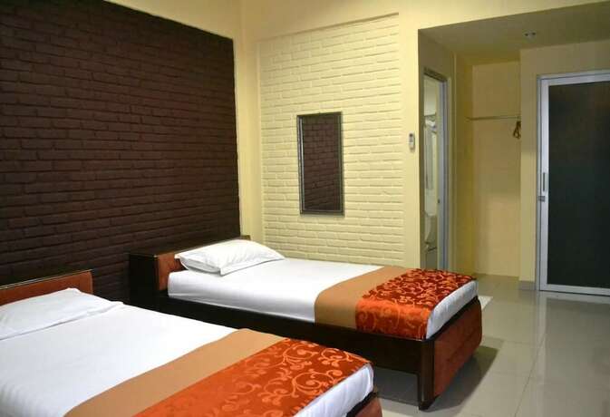 Imagen de la habitación del Hotel Rorompok Homan. Foto 4