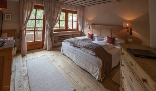 Imagen de la habitación del Hotel Rosa Alpina and Spa. Foto 5