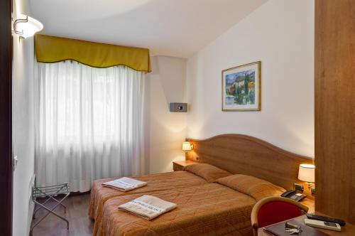 Imagen de la habitación del Hotel Rosa, Cassone. Foto 8