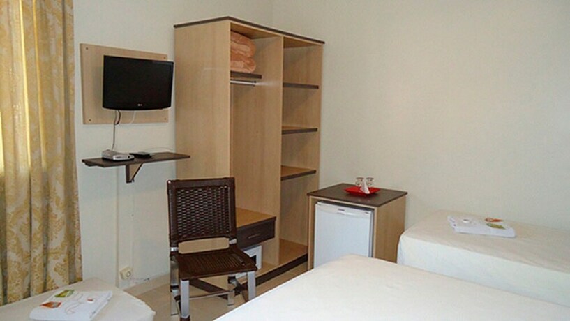 Imagen de la habitación del Hotel Rosa Da Ilha Guaruja - Perto Do Mar. Foto 17