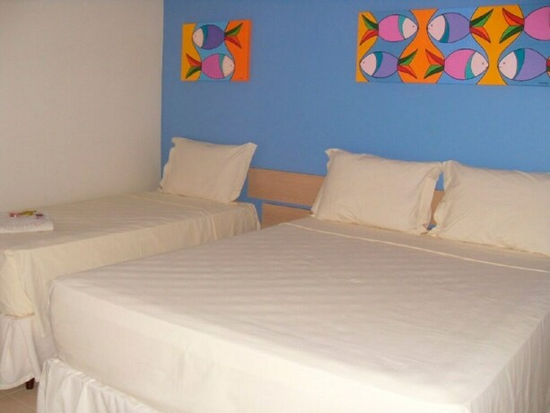 Imagen de la habitación del Hotel Rosa Da Ilha Guaruja - Perto Do Mar. Foto 21
