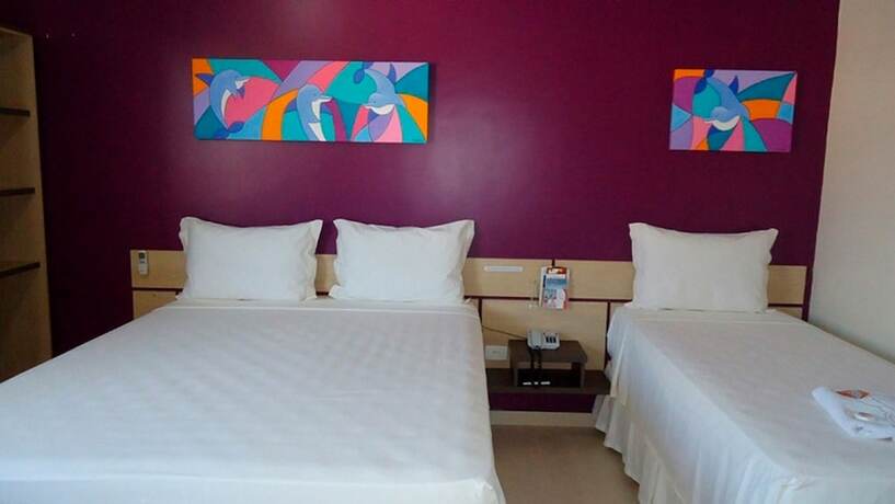 Imagen de la habitación del Hotel Rosa Da Ilha Guaruja - Perto Do Mar. Foto 23