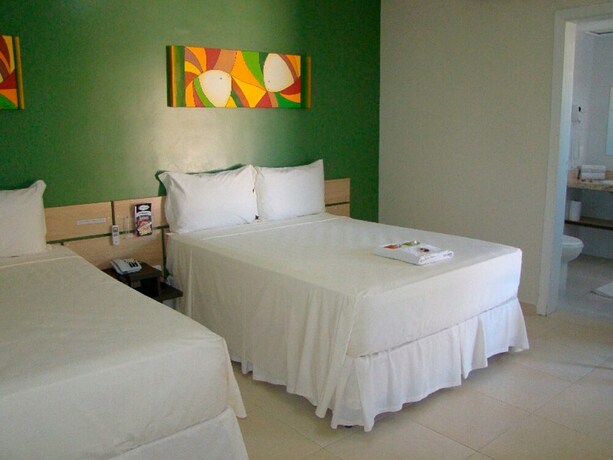 Imagen de la habitación del Hotel Rosa Da Ilha Guaruja - Perto Do Mar. Foto 25
