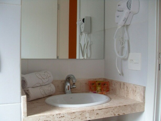 Imagen de la habitación del Hotel Rosa Da Ilha Guaruja - Perto Do Mar. Foto 32