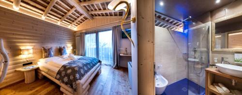 Imagen de la habitación del Hotel Rosa Eco Alpine Spa. Foto 6
