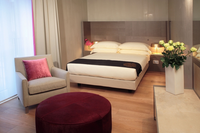 Imagen de la habitación del Hotel Rosa Grand Milano. Foto 11