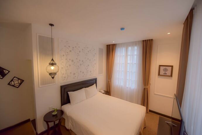 Imagen de la habitación del Hotel Rosa Hanoi. Foto 17