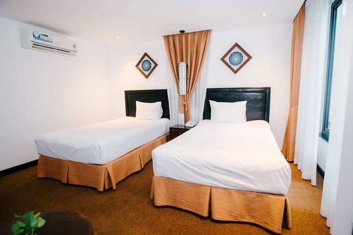 Imagen de la habitación del Hotel Rosa Hanoi. Foto 21