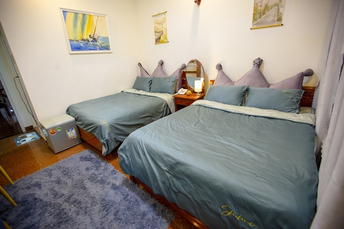 Imagen de la habitación del Hotel Rosa House. Foto 6