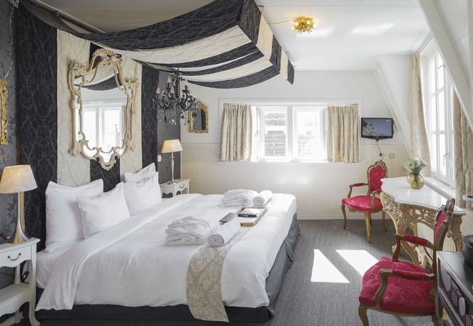 Imagen de la habitación del Hotel Rosalia's Menagerie Innupstairs. Foto 7