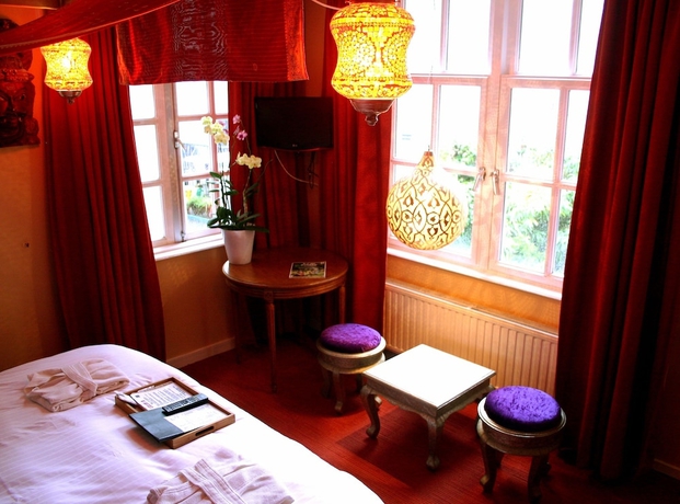 Imagen de la habitación del Hotel Rosalia's Menagerie Innupstairs. Foto 8