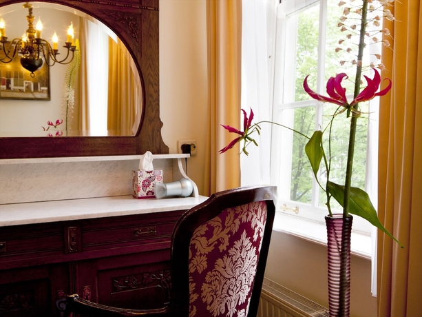 Imagen de la habitación del Hotel Rosalia's Menagerie Innupstairs. Foto 10