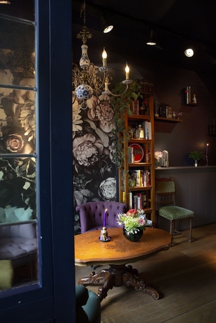 Imagen de los interiores del Hotel Rosalia's Menagerie Innupstairs. Foto 19