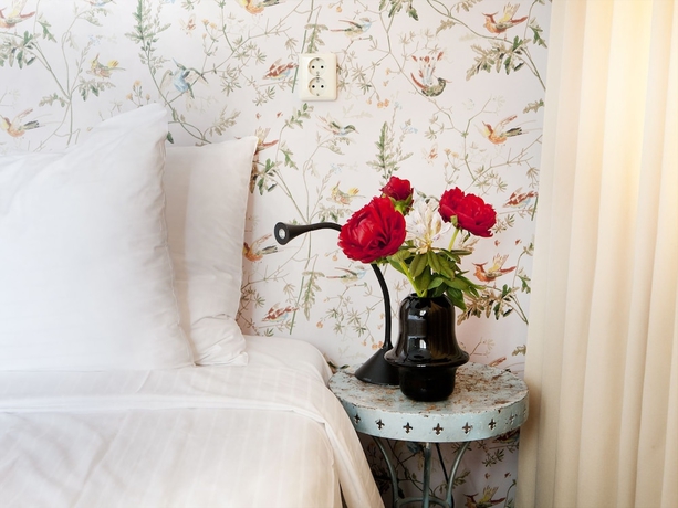 Imagen de la habitación del Hotel Rosalia's Menagerie Innupstairs. Foto 13