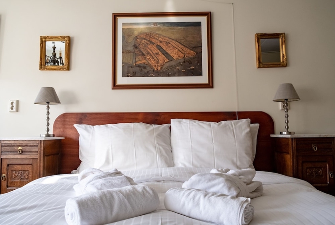 Imagen de la habitación del Hotel Rosalia's Menagerie Innupstairs. Foto 15