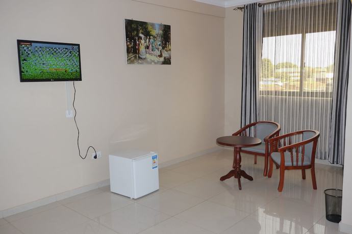 Imagen de la habitación del Hotel Rosaline Suites. Foto 9