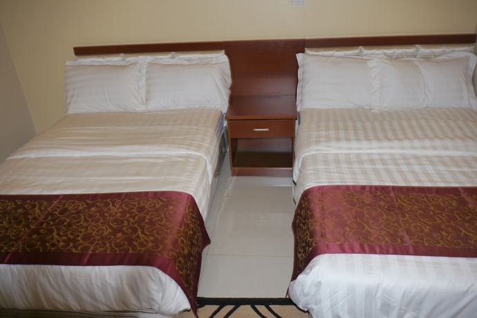 Imagen de la habitación del Hotel Rosaline Suites. Foto 10