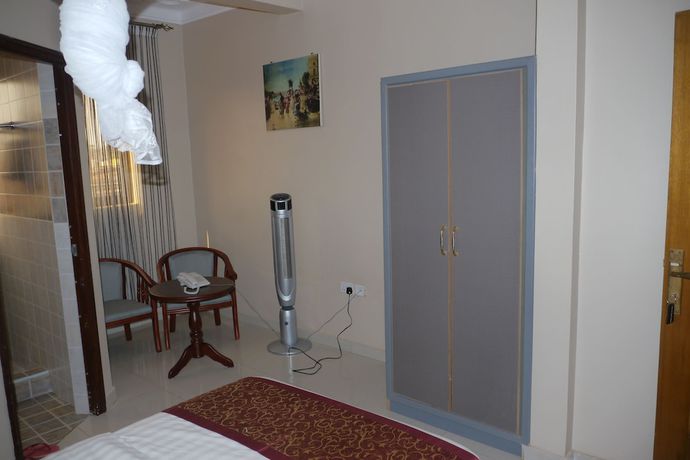 Imagen de la habitación del Hotel Rosaline Suites. Foto 15