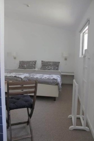 Imagen de la habitación del Hotel Rosalma Hostel. Foto 13