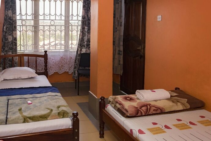 Imagen de la habitación del Hotel Rosama Guest House. Foto 15